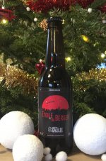 bouteille de bière Etoile du Berger devant un sapin de noël